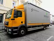 MAN TGM15.250 bei der Zustellung von Waren zu den jeweiligen Gesch�ften; 121102