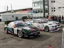 Porsche 911, und daneben die auf dem ersten und zweiten platz stehende BMWs. (13.10.2012 Rheintal Rennen, Hockenheimring)