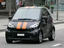 Schwarz / Oranger Smart in Z�rich Altstetten am 01.01.2013