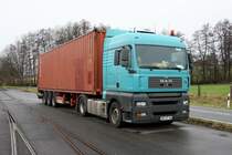 MAN D 20 Common Rail TGA 18 430 mit Container Sattel am 1.2.2013 in
Westerkappeln - Velpe.