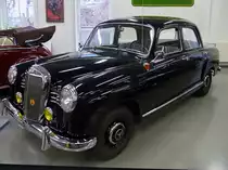 Mercedes 180 (W120), Autosammlung Steim in Schramberg, 6.3.11 
Baujahr 1955
4 Zylinder, 52 PS aus 1800 ccm. 
140 km/h schnell und 1400 kg schwer. 