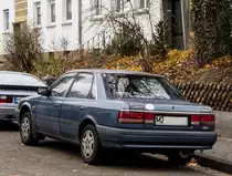 Mazda 626 R�ckansicht. Foto 25.11.2012