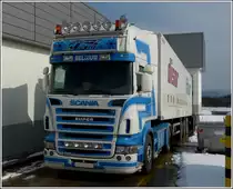 Scania  R 420 mit K�hlauflieger an der Laderampe eines Einkaufmarktes im Norden von Luxemburg aufgenommen am 26.02.2012.