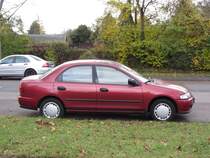 Mazda 323 Sedan, fotografiert am: 06.11.2012.