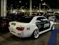 Mercedes-Benz E-Klasse, getunt, fotografiert auf dem Auto Motor und Tuning Show, März 2013