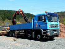 MAN TGA 35.480 mit Ladekran steht an der Laugenleitungsbaustelle der Firma K&S in der Gemarkung von 36100 Petersberg-Marbach, April 2013
