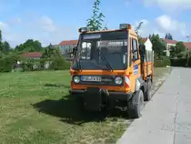 Multicar beim B�umebew�ssern in Bergen/R�gen am 16.Juli 2013.