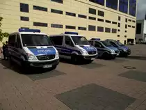 Zwei MB Sprinter und zwei MB Vito der Polizei stehen am 21.09.13 auf der IAA