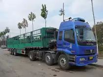 Foton Auman - einen PKW sich vor die Tr stellen kann ja jeder... 
Gesehen in Shouguang, 6.11.11