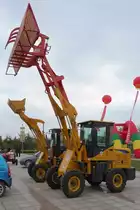 XGMA Radlader XG-916 mit Gabelaufsatz, ausgestellt auf der  China WCAM 2011  in Shouguang, 6.11.11 