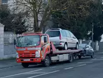 Dieser ISUZU Autotransporter hat gleich 2 Fahrzeuge abgeschleppt.  Dezember 2013