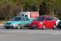 VW Jetta Taxi und Honda Jazz in Shouguang, 20.11.11
