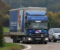 MB Actros MP3  BGL Barsan Global Lojistik  aus der Türkei verlässt die BAB 6 für eine Pause auf einem Parlplatz, 16.10.2013