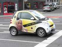 Werbesamrt unterwegs in der Stadt Genf am 11.01.2014