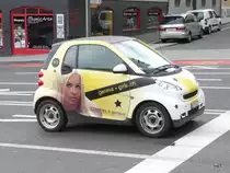 Werbesamrt unterwegs in der Stadt Genf am 11.01.2014