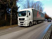 MAN TGX18.440 mit Lugstein-Auflieger auf der L509; 140110