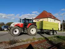 STEYR-6155CVT, zieht einen Tandemachskipper; 131017