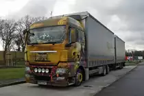 MAN TGX am 08.01.2014 in Bochum.