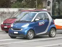 Blauer/Grauer Werbe Smart unterwegs in der Stadt Solothurn am 25.01.2014