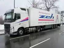 Volvo FH 460 Euro 6 mit Kühl-Auflieger am 02.02.2014 in Berlin-Spandau.