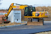 CAT M 315D sichert die Containertür. - 01.03.2014