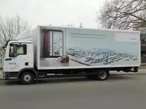 MAN TGL 7.150 mit , meiner Meinung nach interessanter Beklebung , am 04.03.2014 in Bln.-Spandau.