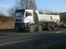MAN Kipper unterwegs Morgens kurz nach 08:00 Uhr,am 10.März 2014,in Bergen/Rügen.