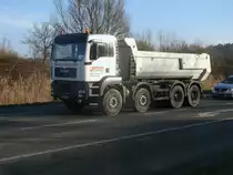 MAN Kipper unterwegs Morgens kurz nach 08:00 Uhr,am 10.März 2014,in Bergen/Rügen.