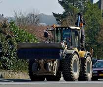 HUDDIG 1260c Radlader mit angebauter Strassenbürste gresehen am 11.03.2014