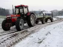 CASE-1056XL, mit einfachem Hänger zum Rundholztransport; 140130