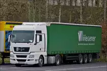 MAN Sattelzug ist abgestellt auf einem Parkplatz.  22.03.2014