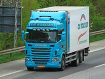 Scania G440 mit Kühlaufbau am 03.04.2014 auf der A4 bei Aachen.