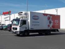 MAN Kühlaster,am 16.Mai 2014,in Bergen/Rügen.