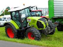 CLAAS Arion 650, gesehen bei der Kreistierschau des LK Fulda in Petersberg-Melzdorf, Juni 2014