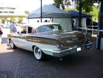 Heckansicht eines Chevrolet Series 1500/1600 Biscayne des Modelljahres 1958 in der Karosserievariante twodoor Sedan. US-cartreffen Centro Oberhausen am 19.07.2014.