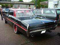 Heckansicht eines 1962´er Pontiac Bonneville fourdoor Hardtop. US-carmeeting Centro Oberhausen am 20.07.2014.