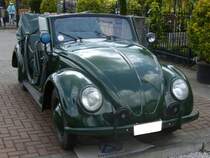 VW Typ 11A. 1948 - 1949. Von diesem Streifenwagenmodell wurden insgesamt 482 Einheiten, wahrscheinlich bei Karmann in Osnabrück, hergestellt. Der 4-Zylinderboxermotor leistet 25 PS aus 1131 cm³ Hubraum. Hebmüllertreffen am 24.08.2014 in Meerbusch.