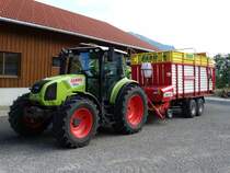 Class Arion 410 mit Pöttinger Faro Ladewagen am 17.08.14 bei Rettenberg 