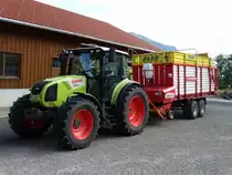 Class Arion 410 mit Pöttinger Faro Ladewagen am 17.08.14 bei Rettenberg 