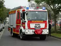 MAN TGM HLF 20/16 (Florian Isenburg 1/46-2) kurz vor dem erreichen der Einsatzstelle am 13.09.14 in Neu-Isenburg beim Tag der Offenen Tür der Feuerwehr 