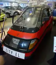 CITY EL, einsitziges Elektro-Dreiradfahrzeug, die Firma in Dnemark hat seit 1986 ber 6.000 Stck gebaut, Vmax.50Km/h, Reichweite ca.50Km, Museum Autovision Altluheim, Sept.2014